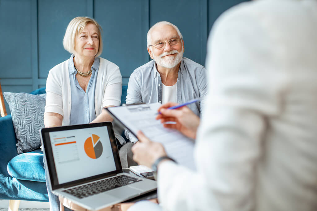 A man and woman receiving financial advice.